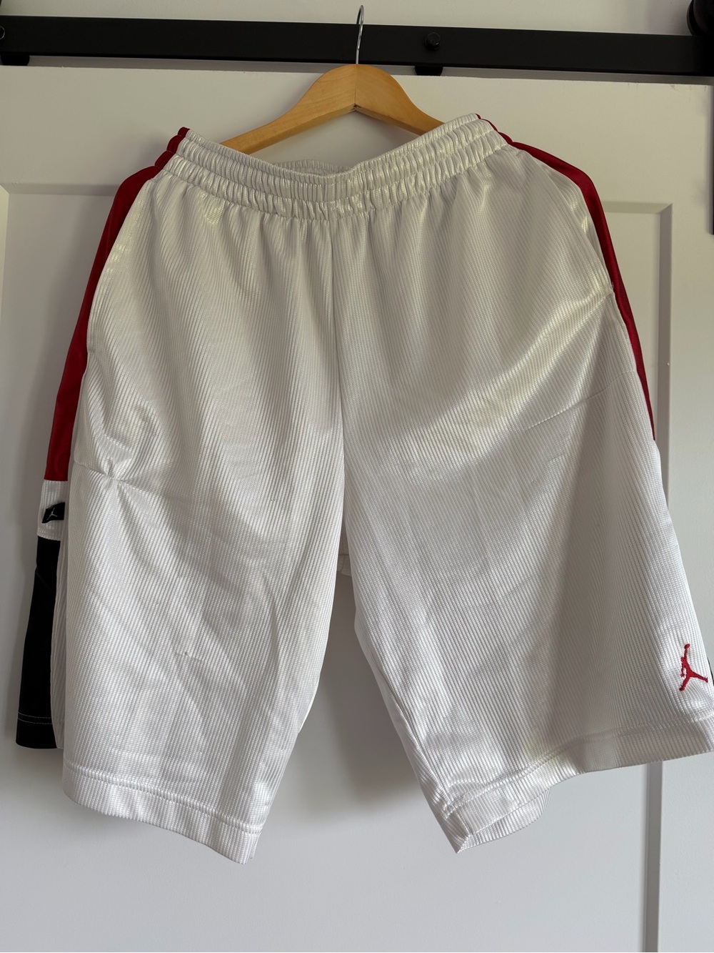 Jordan Men’s White Basketball Shorts with Red Side Panels